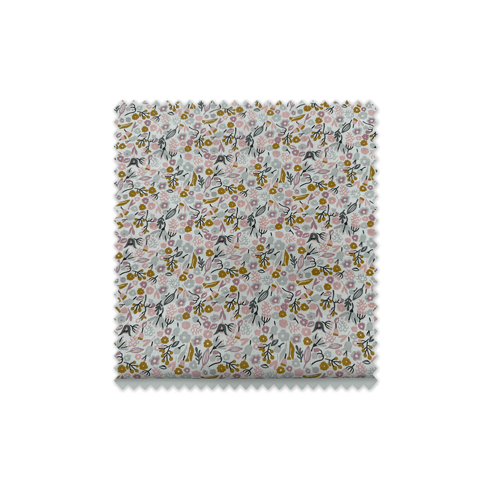 Retal 0,60m de tela popelín de algodón 100% con estampado de flores en tonos rosa, mostaza y antracita.