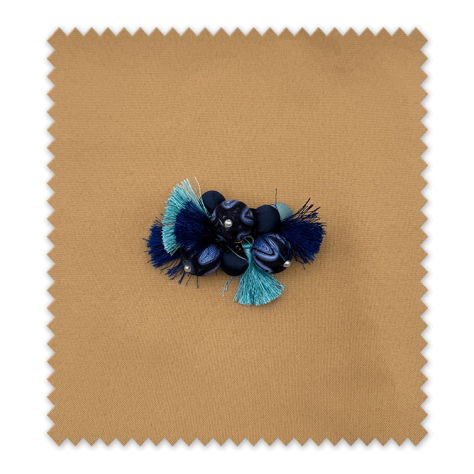 accesorio decorativo azul turquesa con borlas accesorio decorativo azul turquesa con borlas