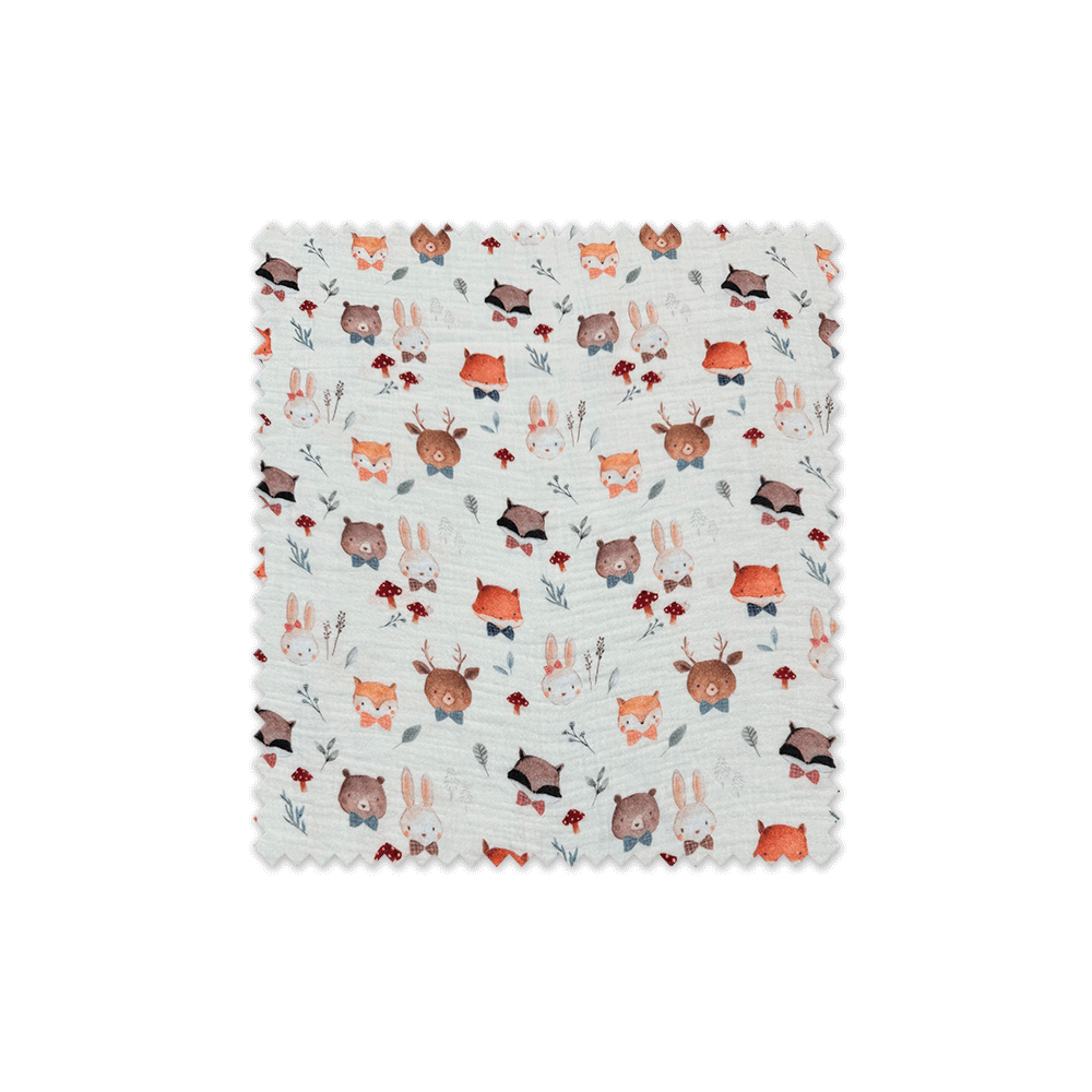 Tela doble gasa algodón 100% con estampado de animales fondo crudo, ideal para confección infantil y accesorios