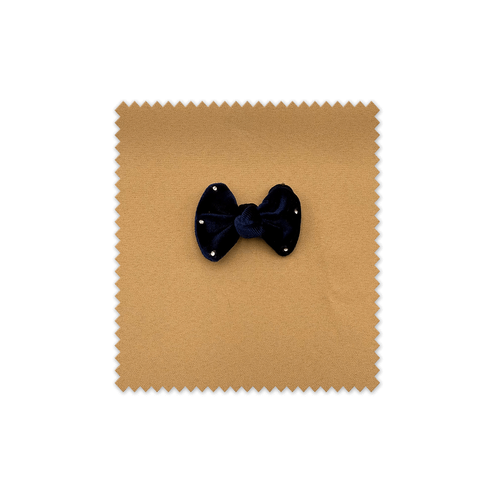 Accesorio, lazo azul marino con destellos y textura aterciopelada