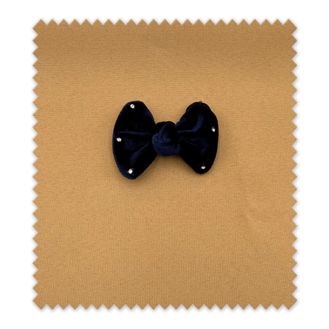 Accesorio, lazo azul marino con destellos y textura aterciopelada