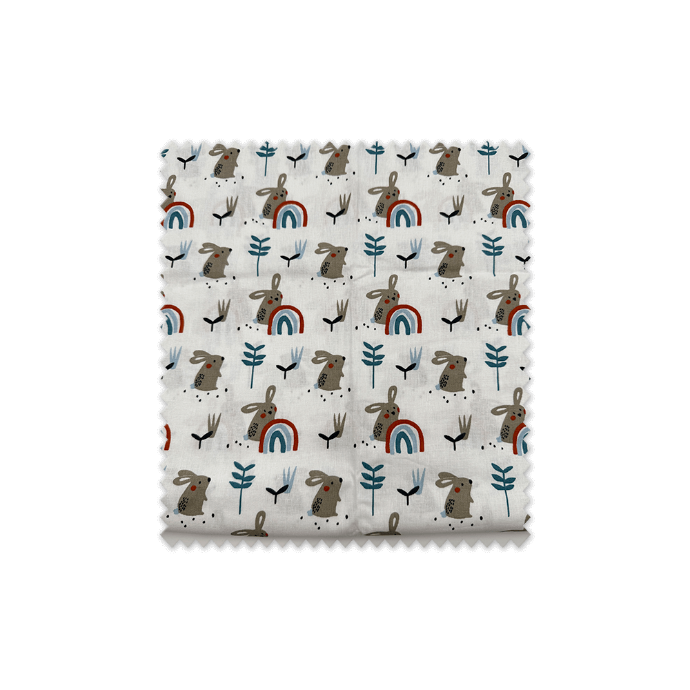 Tela algodón liebres azul fondo claro confección bebé