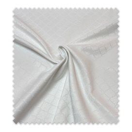 Tejido blanco para manteles con motivo árabe decorativo