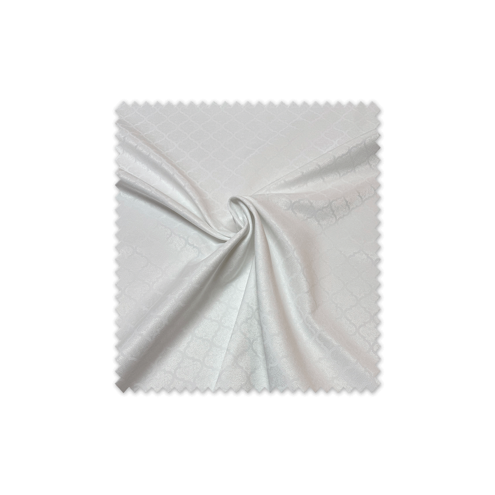 Tejido blanco para manteles con motivo árabe decorativo