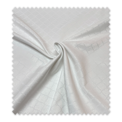 Tejido blanco para manteles con motivo árabe decorativo