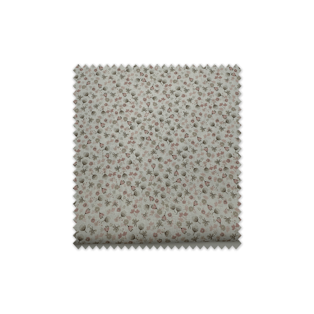 Detalle tejido popelín floral rosa y gris para costura infantil