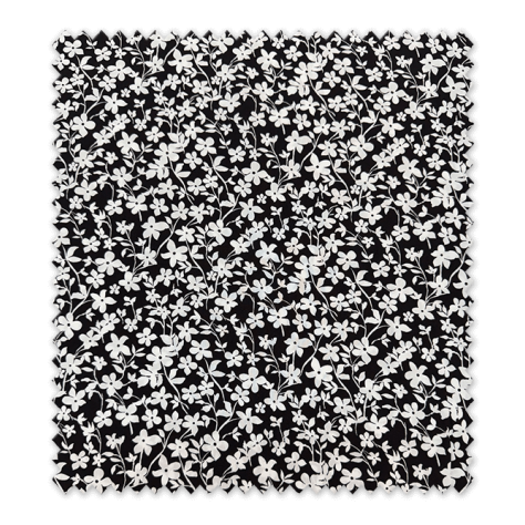 tela viscosa flores blancas fondo negro moda