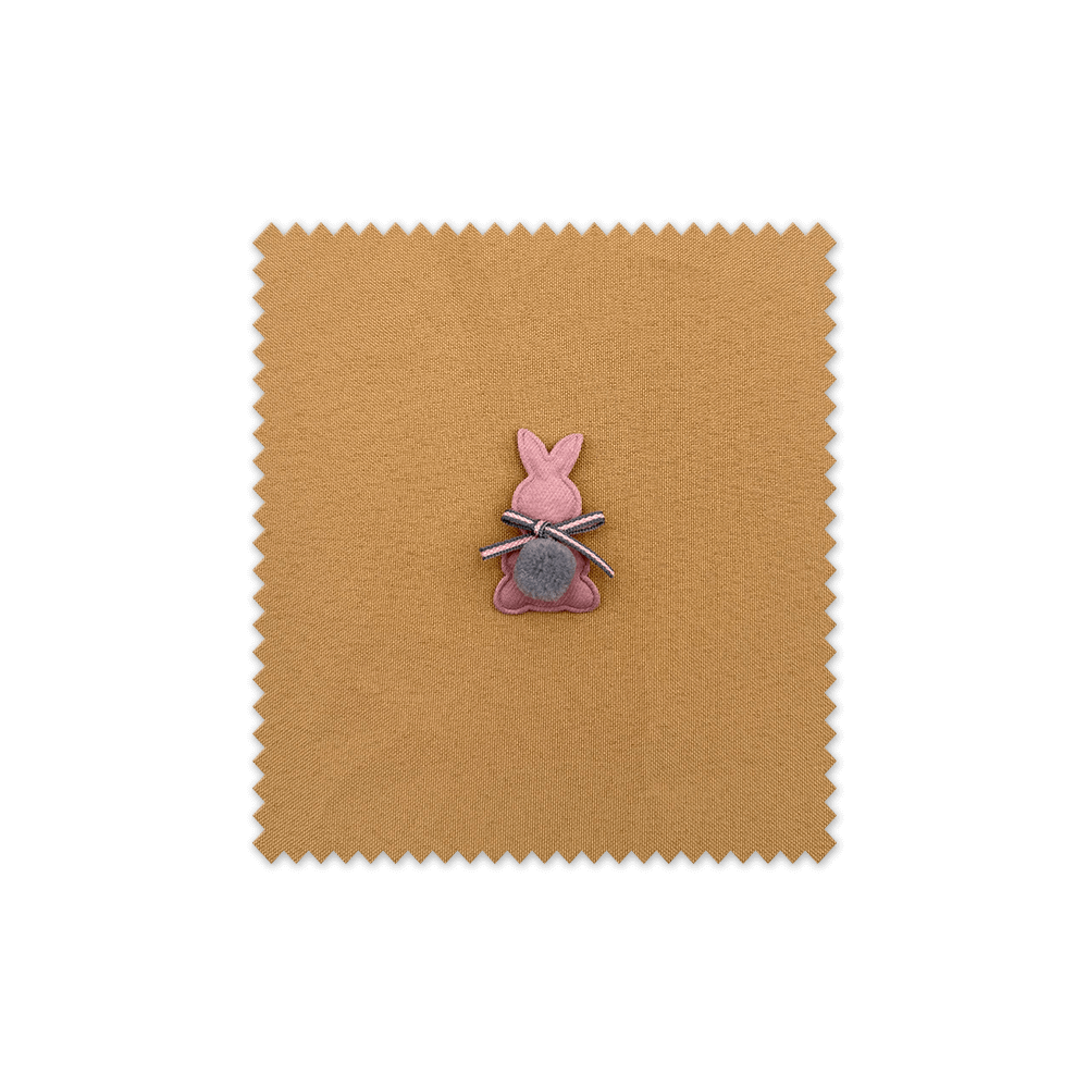 Parche infantil con diseño de conejo gris y pompón