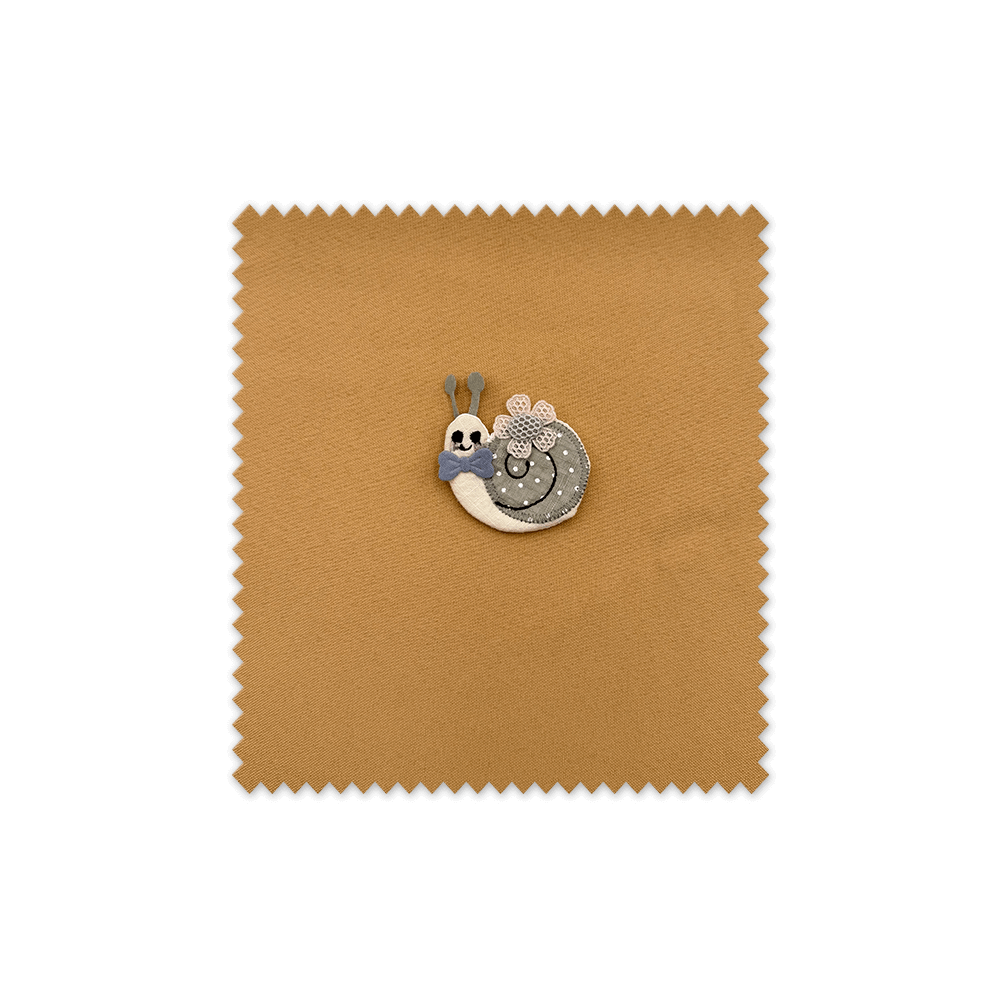 Parche forma caracol, decorar ropa infantil, parches coser, manualidades textiles, parches decorativos