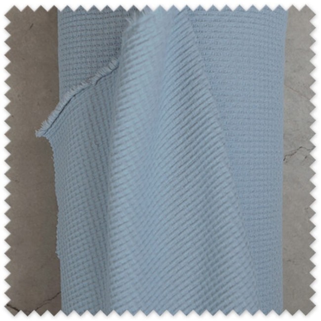 Tela waffle plano algodón orgánico azul gris