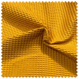 tela gofre color mostaza detalle relieve