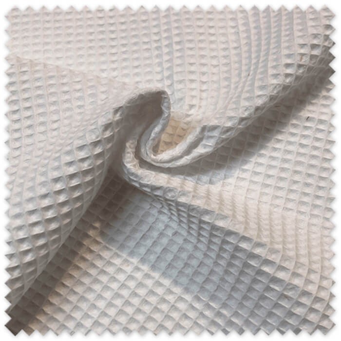 tejido waffle blanco para ropa infantil