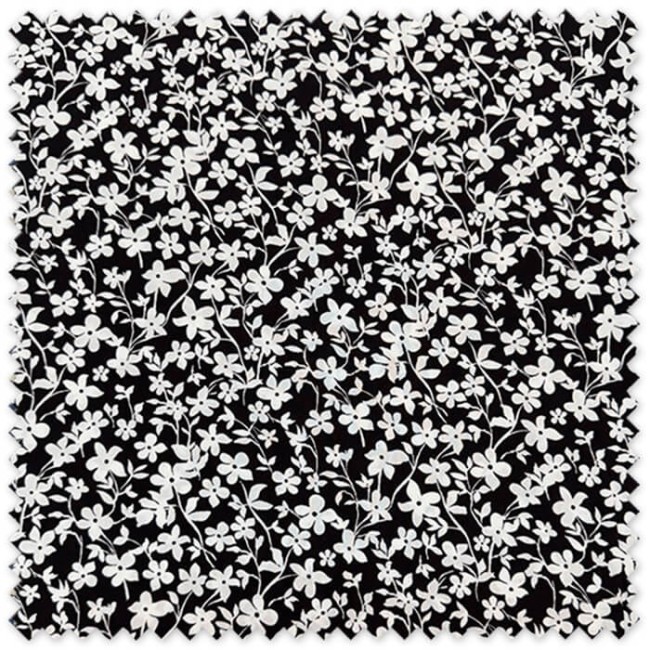 tela viscosa flores blancas fondo negro moda