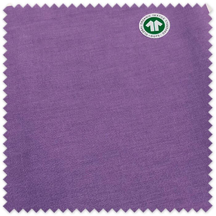 Tela sostenible lila para confección infantil