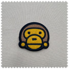 Parche mono para coser decorativo