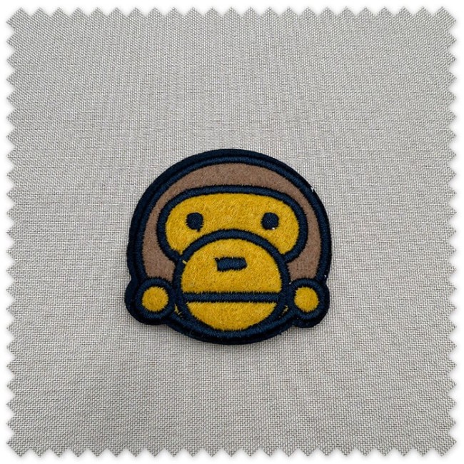Parche mono para coser decorativo