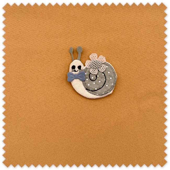 Parche forma caracol, decorar ropa infantil, parches coser, manualidades textiles, parches decorativos