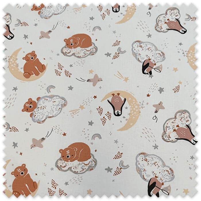 tela infantil de algodón con lunas y nubes en colores tierra