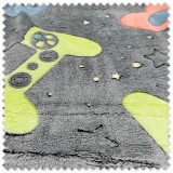 Tela coralina que brilla en la oscuridad con dibujos de videojuegos | Venta de telas Online