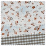 Idea combinado de telas infantiles con estampado de animales del espacio en tonos tierra.
