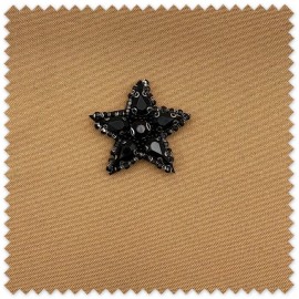 Aplicación textil estrella con pedrería
Parche elegante para ropa y accesorios