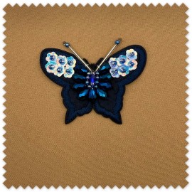 Parche decorativo mariposa para coser
Aplicación textil mariposa azul elegante