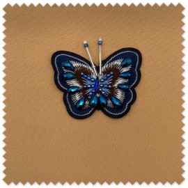 Parche mariposa azul redonda con lentejuelas