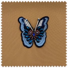 Aplique mariposa azul con piedras brillantes
Parche decorativo mariposa alargada para coser