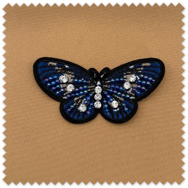 Parche mariposa azul especial con lentejuelas