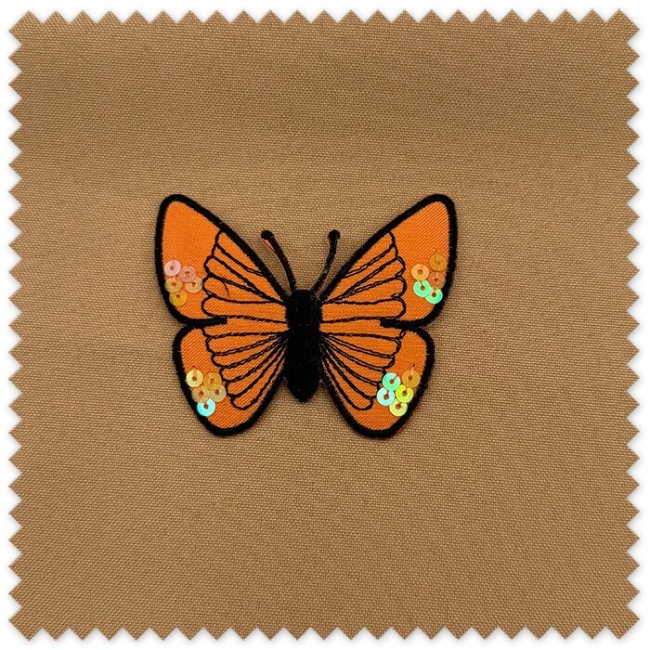 Parche para mochilas y bolsos
Mariposa decorativa con lentejuelas