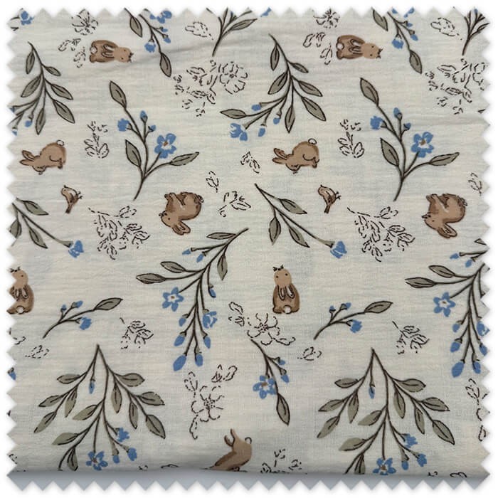Retal 0,70 m de Doble Gasa con estampado de conejitos sobre fondo crudo, tela infantil para bebés, patchwork