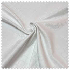 Tejido blanco para manteles con motivo árabe decorativo