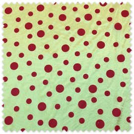 Tela rasete amarilla con lunares rojos, ideal para disfraces de Carnaval, vestuario festivo, decoración y manualidades.