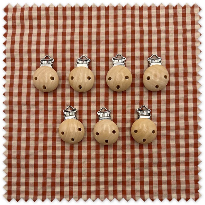 Pack de 7 pinzas de madera para chupeteros con forma circular